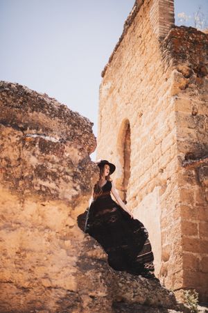 female in ruins of old castle