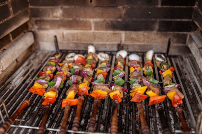 cooking skewers in barbecue