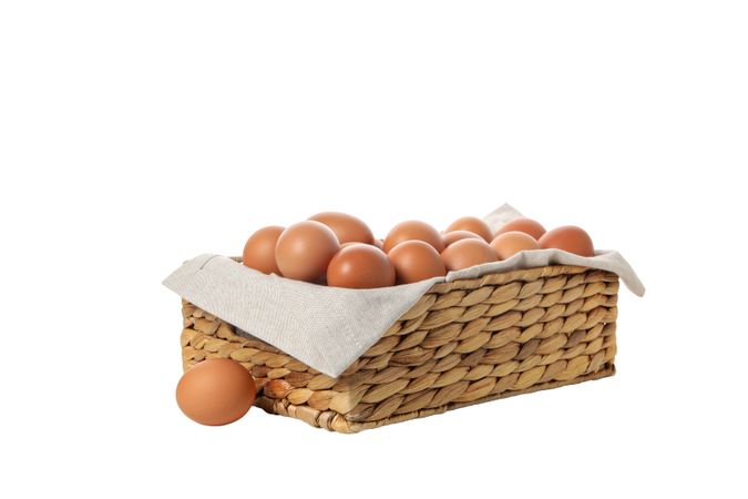 eggs in a square basket, isolated on blank background.