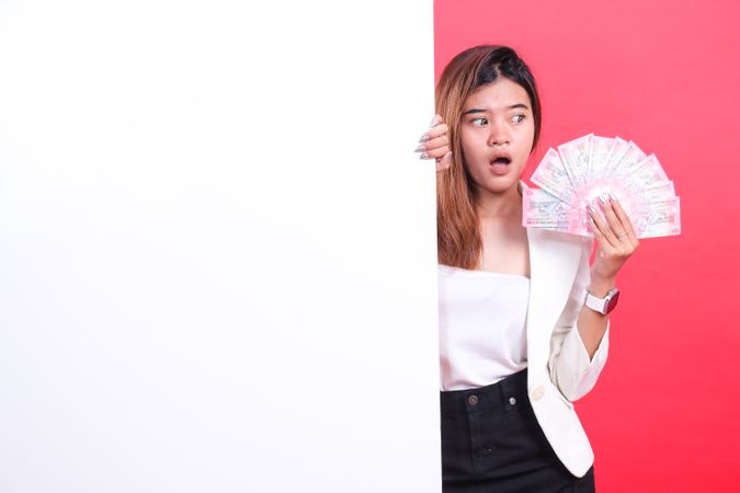 Woman with a Fan of Money
