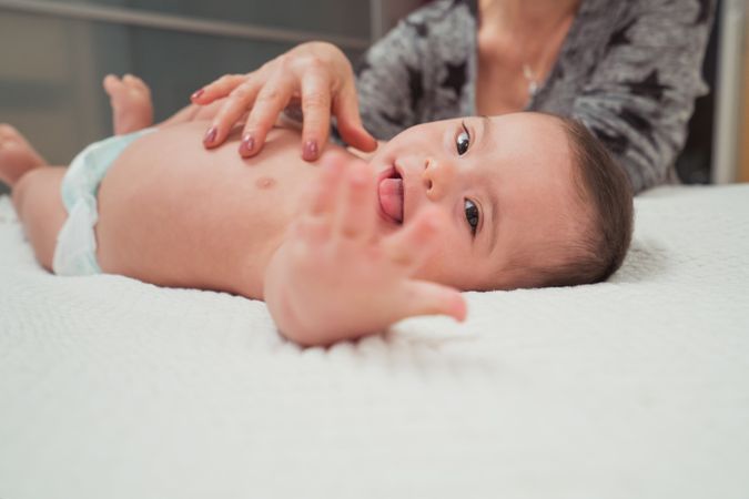 Portrait of cute baby boy with Down syndrome