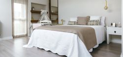 Bedroom with double bed and cot