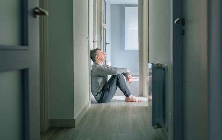 Man sitting on the floor