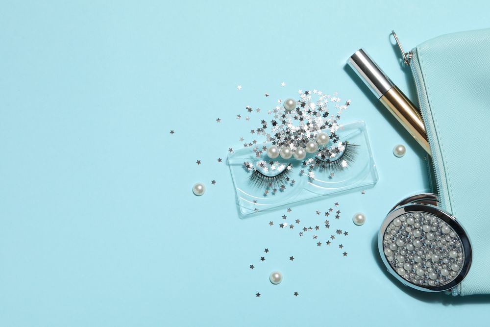 concept of cosmetology tools and beauty treatment, false eyelashes