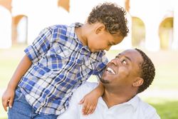 Happy Father and Son Playing