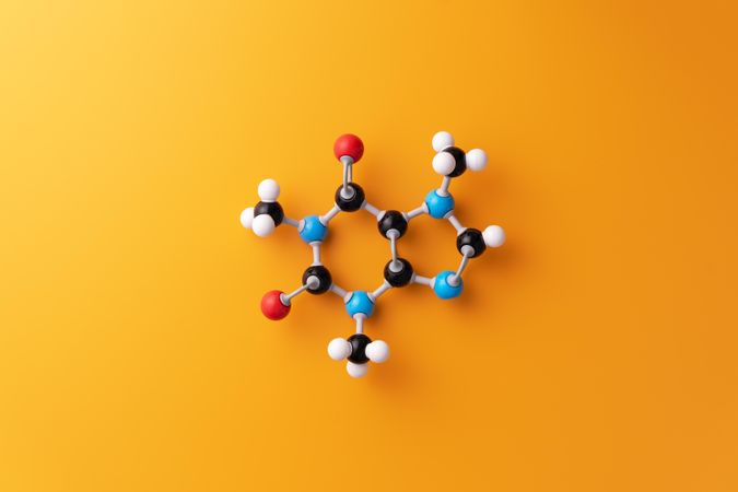 Molecular structure over orange background