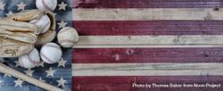 Vintage baseball objects on rustic USA wooden flag 5k2B30