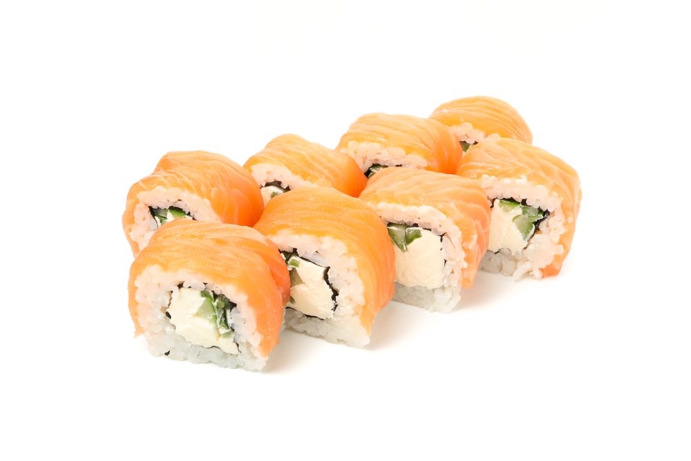 Japanese food. Delicious sushi rolls isolated on light background