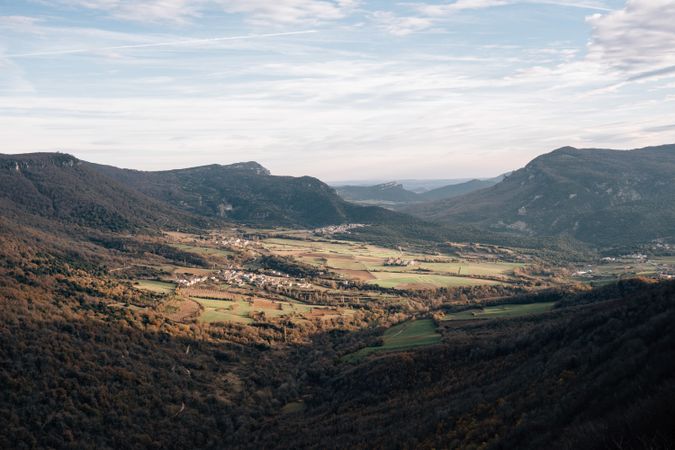 Cloudy sky over beautiful valley and mountains
