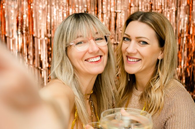 Cheerful women with glass of champagne