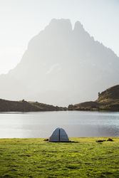 Majestic mountain landscape with tourist tent