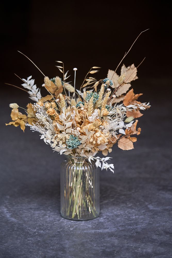 Bouquet of dried flowers in jar