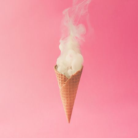 Ice cream cone smoke on pastel pink background