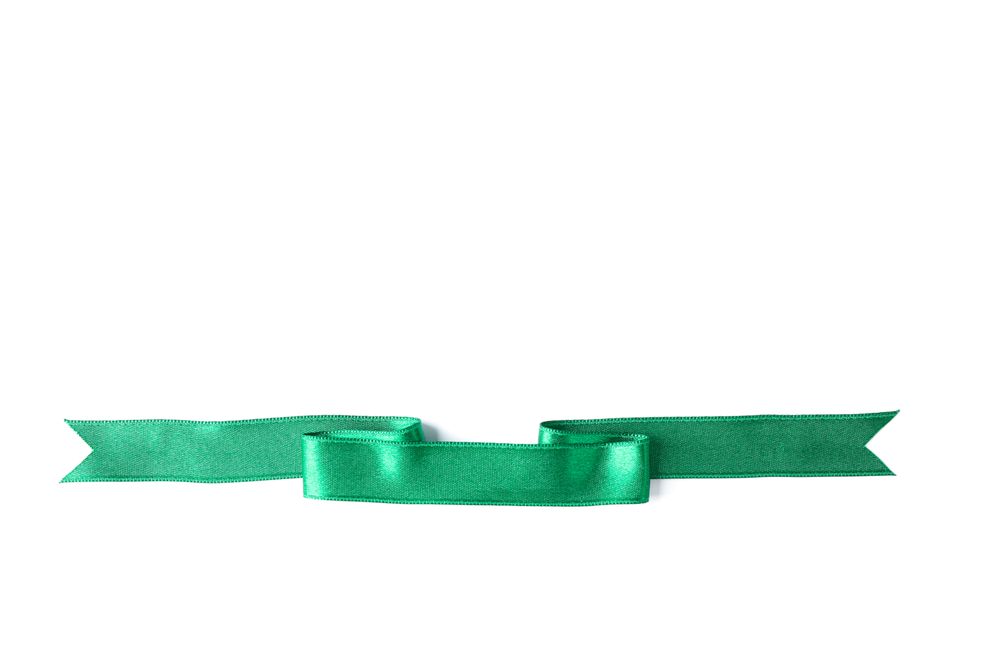 Green ribbon isolated on blank background. Gift concept