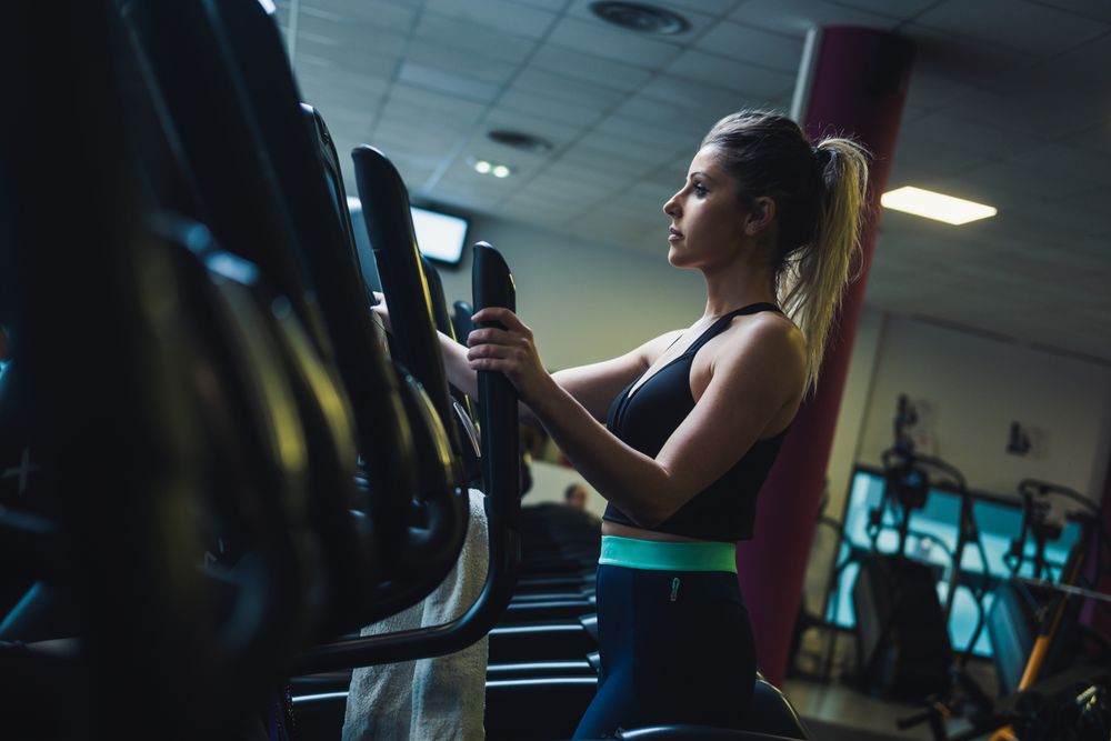 woman on exercise machine