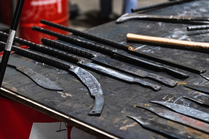 Different metal sharp tools at workbench