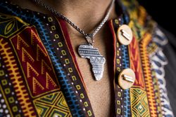 Silver pendant depicting Africa on neck