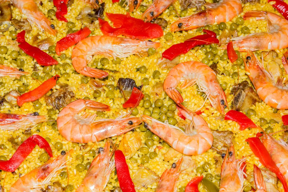Detail of traditional spanish paella cooked in a pan