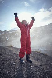 Kid screaming in sunny morning in mountains