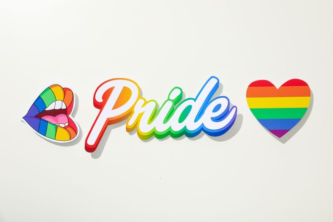 Pride parade concept, word on light background.