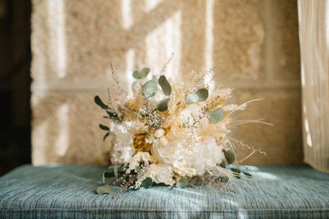 Elegant bouquet on soft cushion