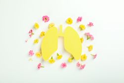 Yellow lungs surrounded with flowers