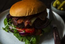 Burger with all the trimmings close up