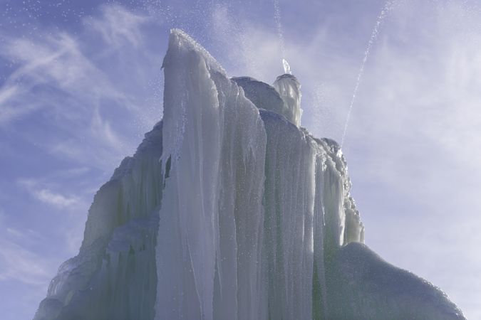 An ice fountain against a blue sky
