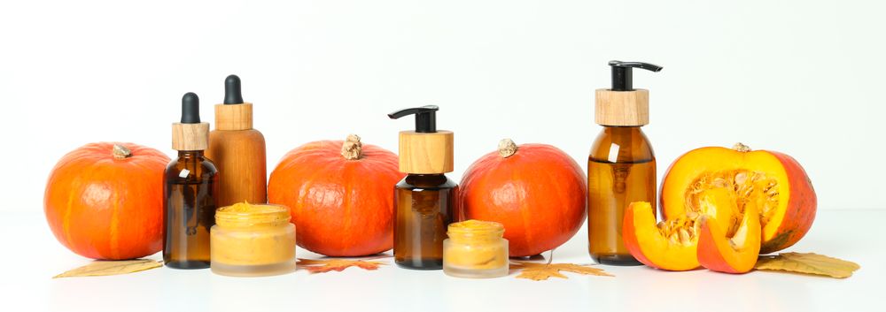 Concept of different cosmetic products, Pumpkin cosmetics