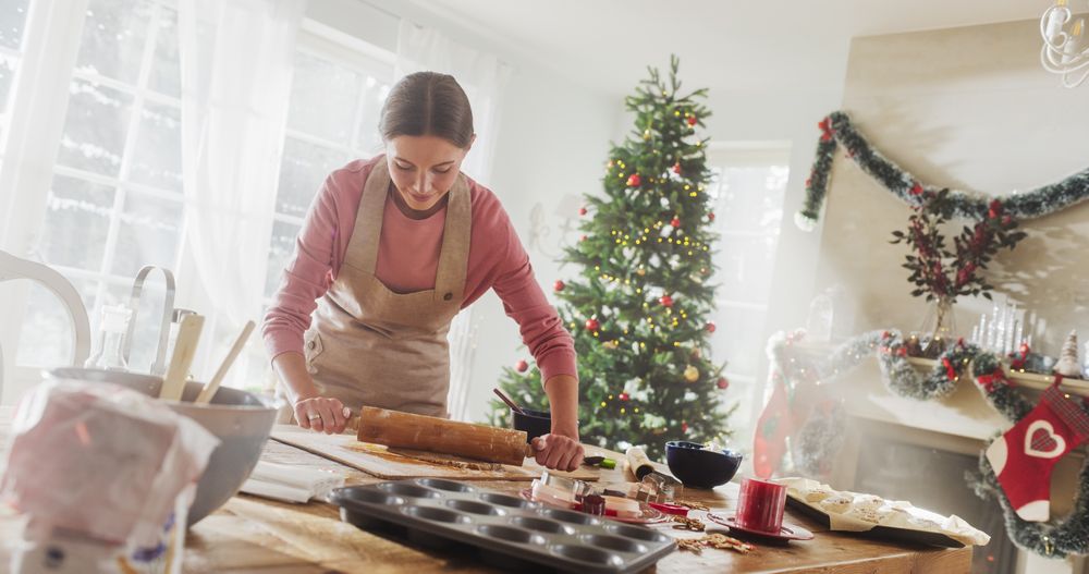 Portrait of Female Preparing Dough for Making Gingerbread for Christmas at Home.