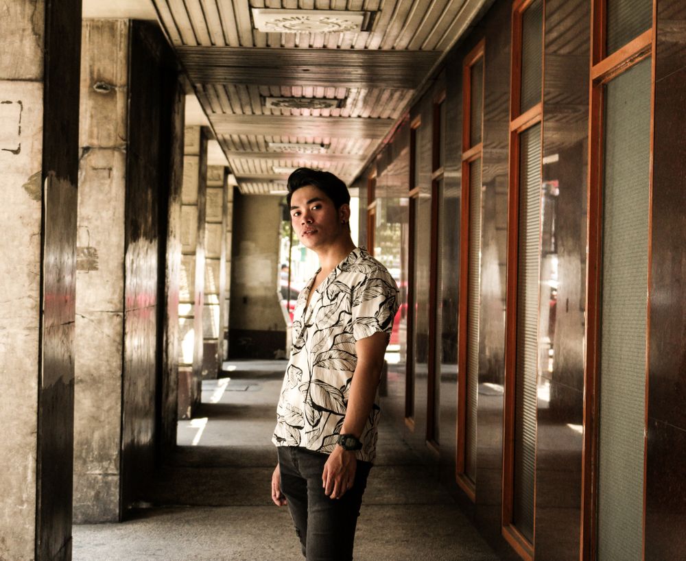 Man standing in a hallway
