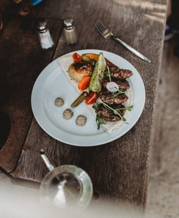 arabic kebab plate with vegetables