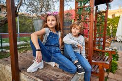 Children sitting together in park