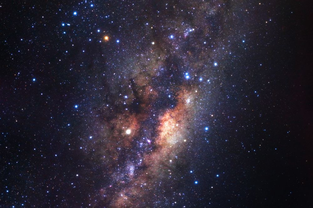 Milky way galaxy with stars and space dust in the universe, Long exposure photograph, with grain.