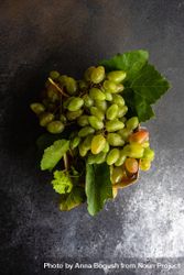 Box of fresh green grapes on grey kitchen counter 5kRrqL