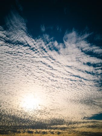 Picturesque cloudy sky at sundown