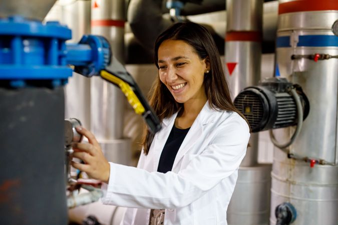 Safety inspector checking piping system