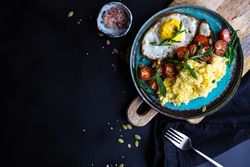 Top view of healthy breakfast plate with copy space