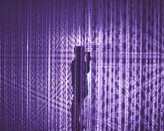 Tokyo, Japan - November 19th, 2019: Man inside purple art installation