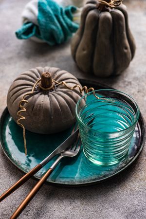 Ceramic pumpkin decorations with teal plate