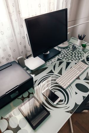 Workstation with table, computer and printer