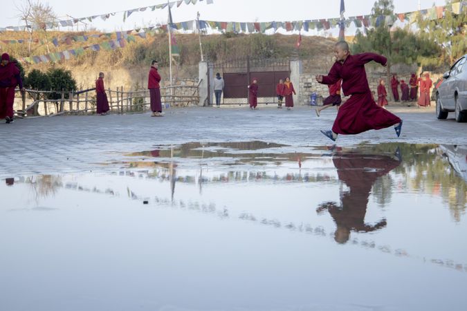 Young Buddhist monks playing outdoor in Nepal