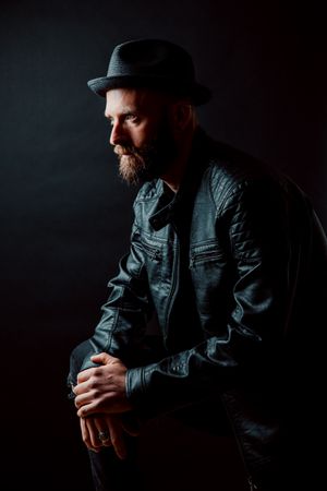 Young bearded guy in leather jacket