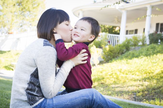 Chinese Mother Having Fun with Her Biracial Son