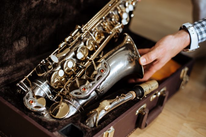 Man holding saxophone