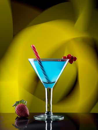 Glass with drink and berries