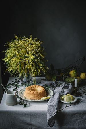 Bundt cake cut into pieces on table