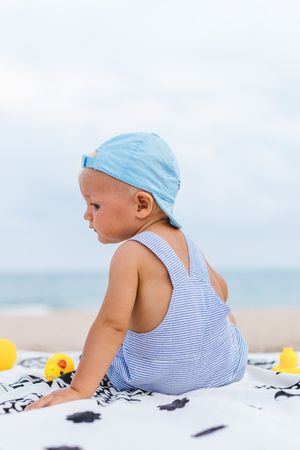 Rear view of a baby with a cap