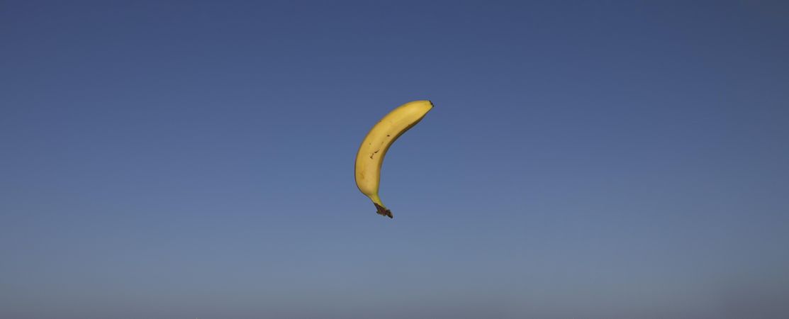 Floating banana in sky