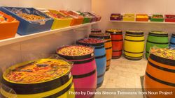 Wooden barrels filled with colorful candies beK1K5